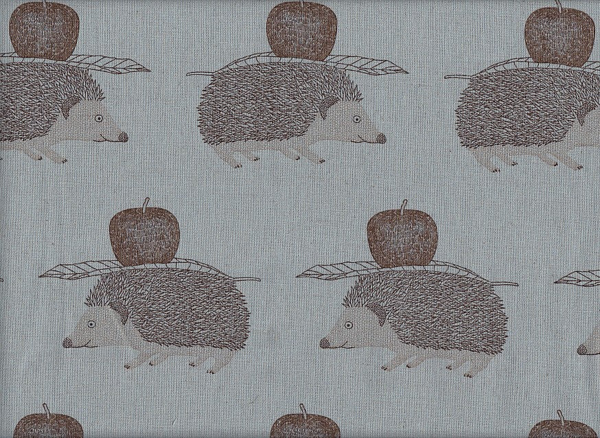 Wachstuch Igel und Apfel